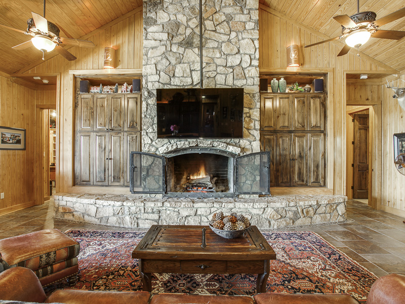 Circle 12 Ranch, 18901 Bradshaw Lane Thackerville 73459, Angie Nelson, Briggs Freeman Sotheby's luxury home for sale in Dallas Fort Worth-fireplace