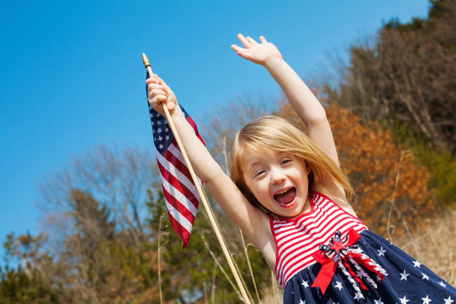 Girl with flag - shutterstock_195107237